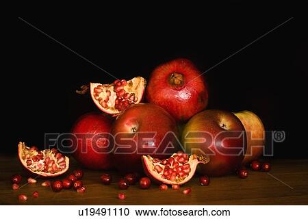 Pomegranates apples and cranberries View Large Photo Image Stock Image - Pomegranates apples and cranberries. Fotosearch