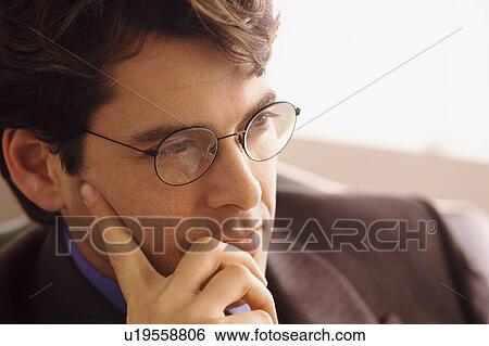 Portrait of a businessman View Large Photo Image Stock Photograph - Portrait of a businessman. Fotosearch