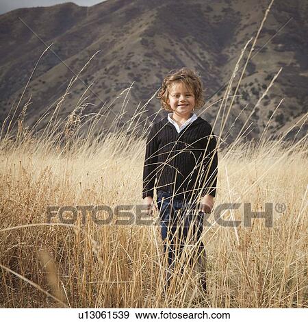 Stock Photo - Portrait of a child outdoors. Fotosearch