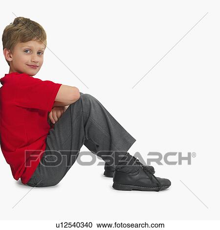 Stock Image - Portrait of a young boy. Fotosearch