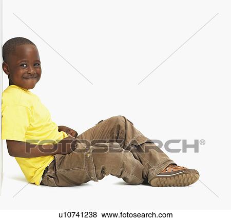 Portrait of a young boy View Large Photo Image Stock Photo - Portrait of a young boy. Fotosearch