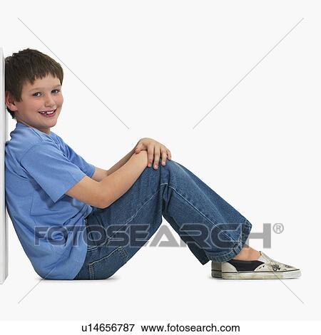 Portrait of a young boy View Large Photo Image Stock Photo - Portrait of a young boy. Fotosearch