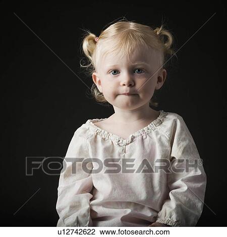 Portrait of a young girl View Large Photo Image Stock Image - Portrait of a young girl. Fotosearch