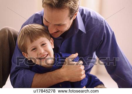 Stock Photo - Portrait of father and son. Fotosearch