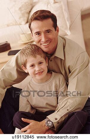 Stock Photography - Portrait of father and son. Fotosearch