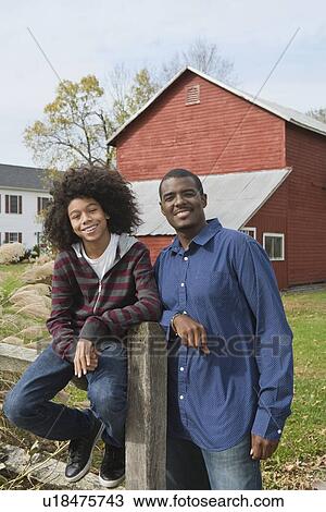 Stock Image - Portrait of man and child. Fotosearch