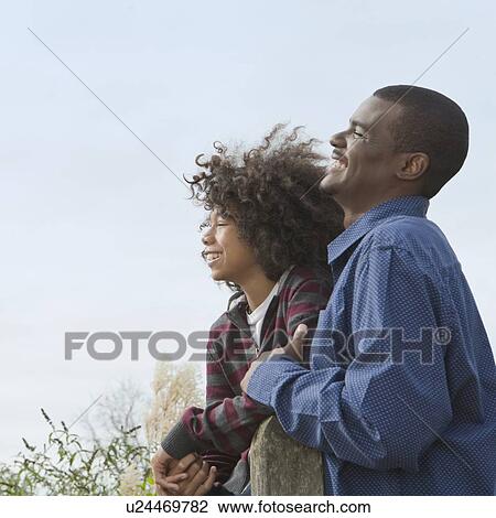 Stock Image - Portrait of man and child. Fotosearch