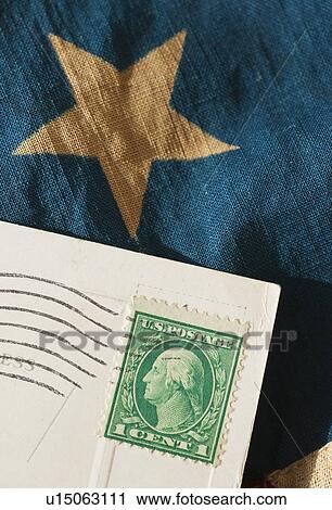 Stock Image - Postcard on American flag. Fotosearch