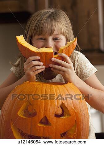 Picture - Pumpkin carving. Fotosearch