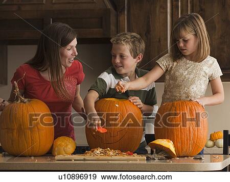 Pumpkin carving View Large Photo Image Stock Photo - Pumpkin carving. Fotosearch