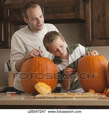 Pumpkin carving View Large Photo Image Stock Photo - Pumpkin carving. Fotosearch