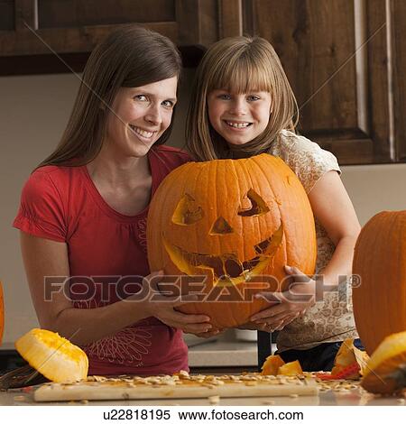 Stock Photography - Pumpkin carving. Fotosearch
