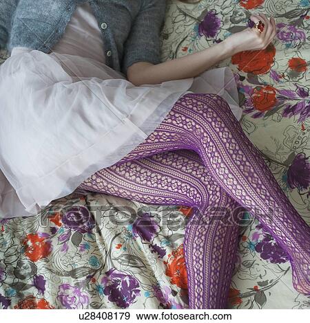 Purple tights on woman's legs View Large Photo Image Stock Photo - Purple tights on woman's legs. Fotosearch