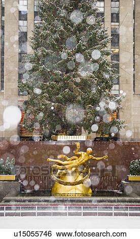 Rockefeller center on a snowy day View Large Photo Image Stock Photograph - Rockefeller center on a snowy day. Fotosearch