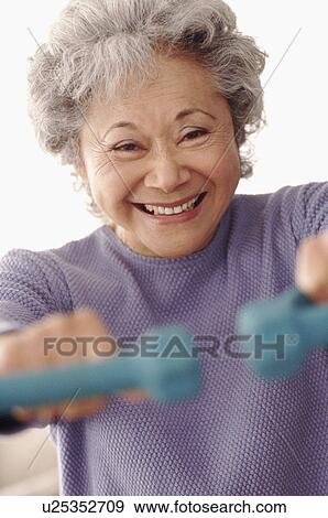 Stock Photo - Senior exercising. Fotosearch