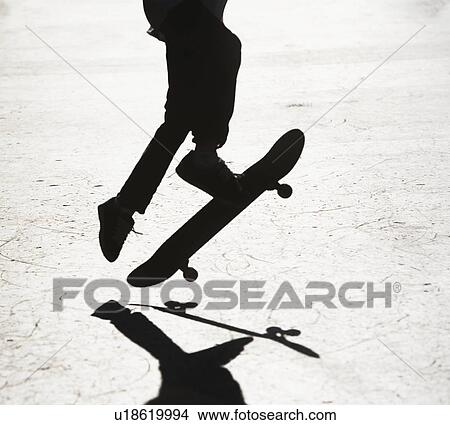 Picture - Silhouette of skateboarder. Fotosearch