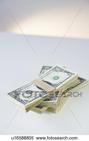 Stock Photography - Stacks of money. Fotosearch