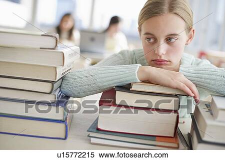 Stock Photography - Student and books. Fotosearch