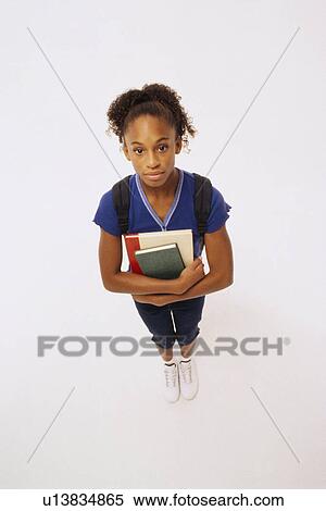 Student holding books View Large Photo Image Stock Photography - Student holding books. Fotosearch