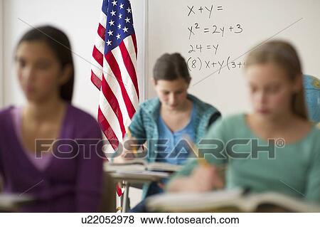Stock Photo - Students in classroom. Fotosearch