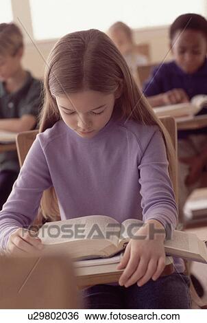 Stock Photograph - Students in classroom. Fotosearch