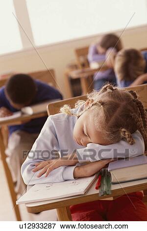 Students sleeping at desks View Large Photo Image Stock Photo - Students sleeping at desks. Fotosearch