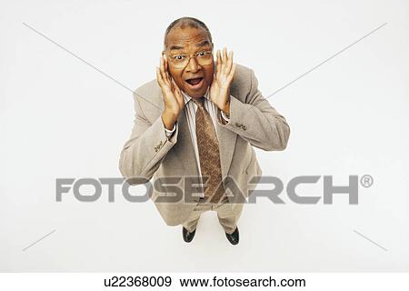 Surprised businessman View Large Photo Image Stock Photo - Surprised businessman. Fotosearch
