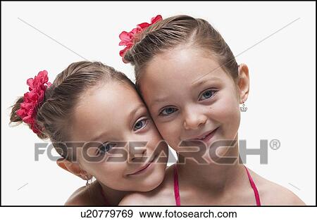 Stock Photo - Twin sisters. Fotosearch