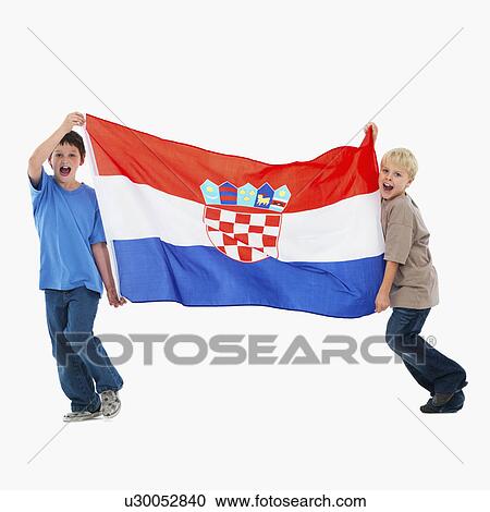 Two boys carrying flag View Large Photo Image Stock Image - Two boys carrying flag. Fotosearch