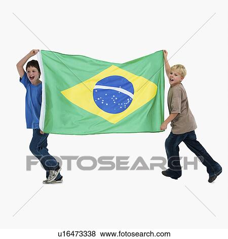 Stock Photo - Two boys carrying flag. Fotosearch