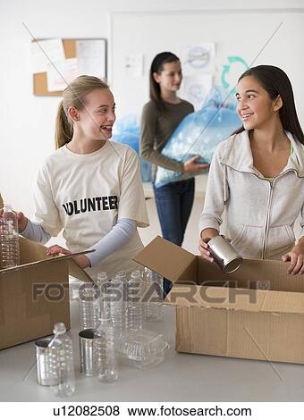 Stock Photo - Volunteers recycling. Fotosearch