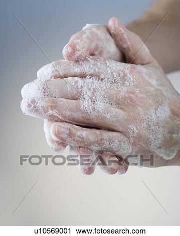 Stock Image - Washing hands. Fotosearch