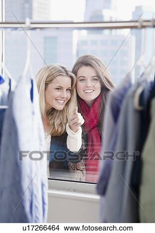 Window shopping View Large Photo Image Picture - Window shopping. Fotosearch