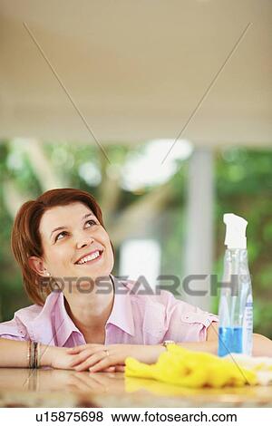 Stock Photo - Woman admiring housework. Fotosearch
