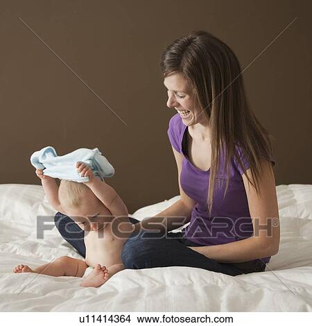 Woman and baby View Large Photo Image Picture - Woman and baby. Fotosearch