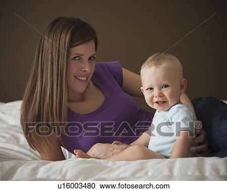 Woman and baby View Large Photo Image Stock Image - Woman and baby. Fotosearch