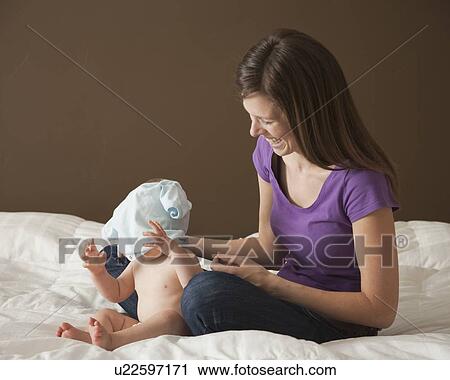 Woman and baby View Large Photo Image Stock Image - Woman and baby. Fotosearch