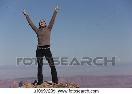Woman at top of canyon View Large Photo Image Stock Photography - Woman at top of canyon. Fotosearch