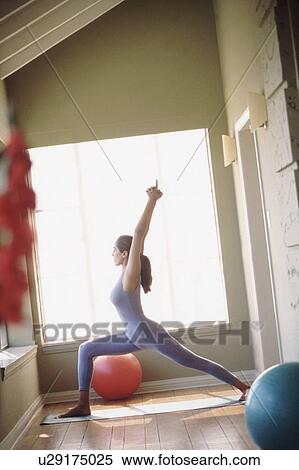 Woman doing yoga pose View Large Photo Image Stock Photography - Woman doing yoga pose. Fotosearch