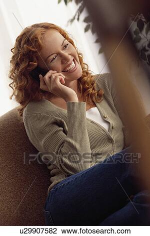 Stock Image - Woman on the phone. Fotosearch