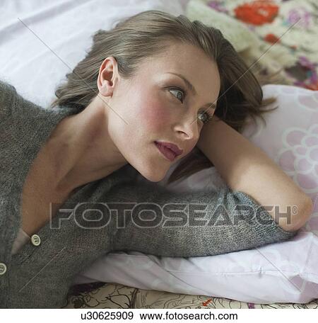 Stock Photo - Woman resting. Fotosearch