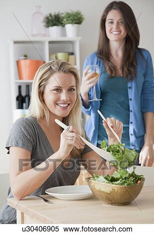 Woman serving salad View Large Photo Image Stock Photography - Woman serving salad. Fotosearch