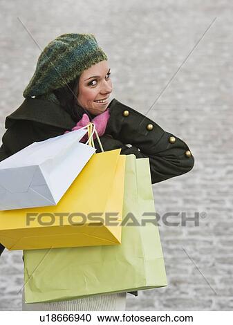 Stock Image - Woman shopping. Fotosearch