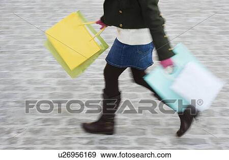 Woman shopping View Large Photo Image Stock Photo - Woman shopping. Fotosearch