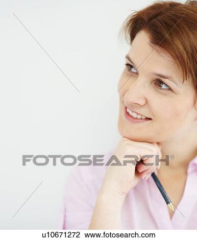 Stock Image - Woman thinking. Fotosearch