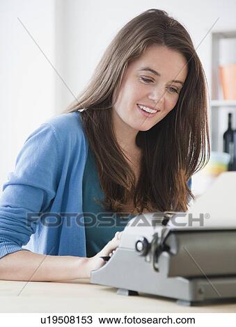 Stock Image - Woman typing. Fotosearch