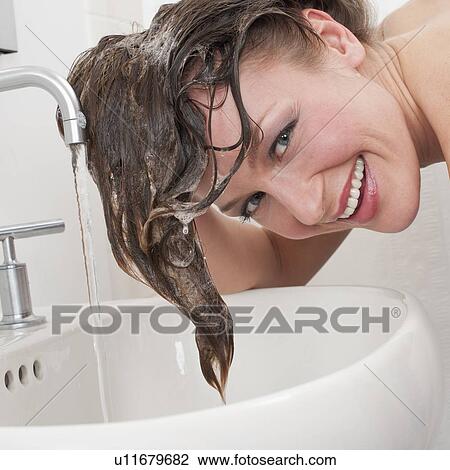Woman washing hair View Large Photo Image Stock Image - Woman washing hair. Fotosearch