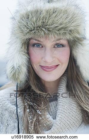 Stock Photography - Woman wearing fur hat. Fotosearch