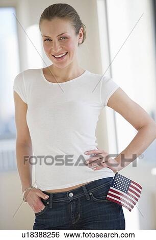 Woman with American flag in pocket View Large Photo Image Stock Photograph - Woman with American flag in pocket. Fotosearch