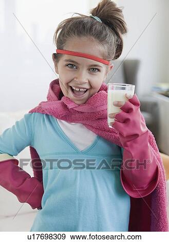 Young girl dressed up as a superhero View Large Photo Image Stock Photo - Young girl dressed up as a superhero. Fotosearch
